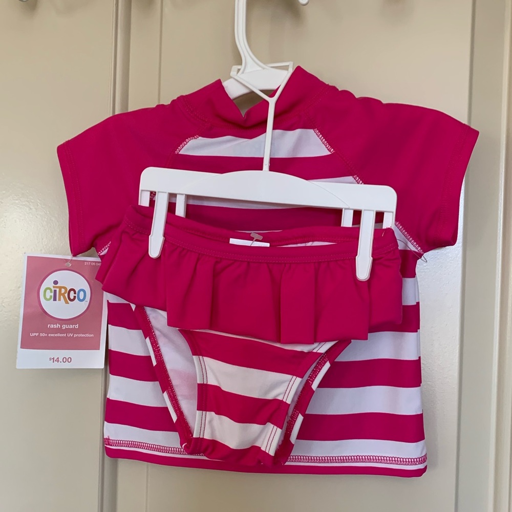 New with tags. 2-piece striped swimsuit